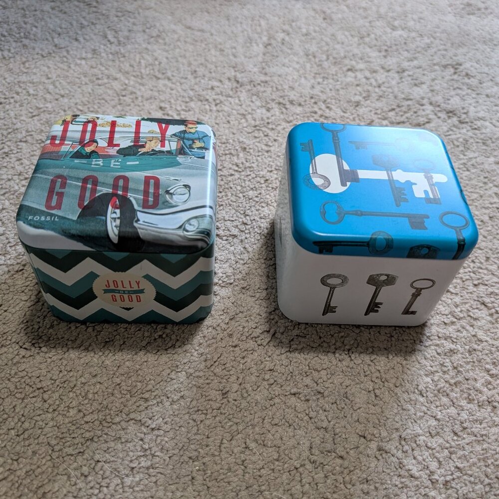 Fossil Watch collector tins (two)